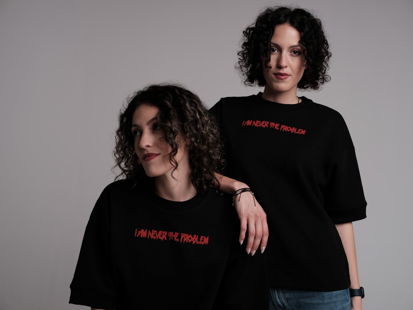 T-SHIRT - LADIES - I AM NEVER THE PROBLEM - ONE SIZE / OVERSIZED